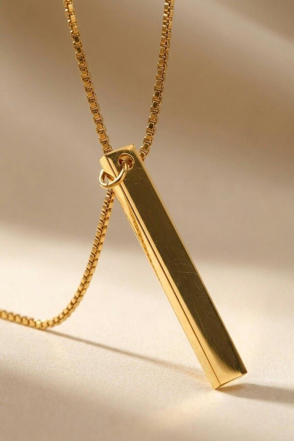 ARIIRA Devon Gold Tone Lariat Bar Pendant