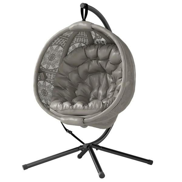 Sand-toned round egg basket chair with black steel stand and padded seat cushion