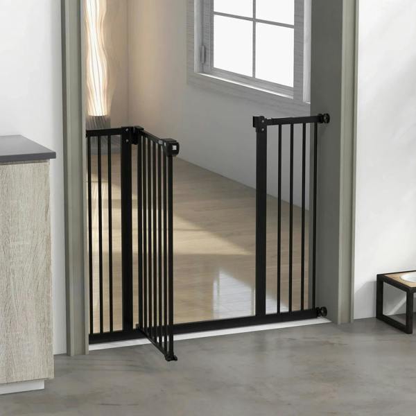 Black metal safety gate across a doorway with side frame posts