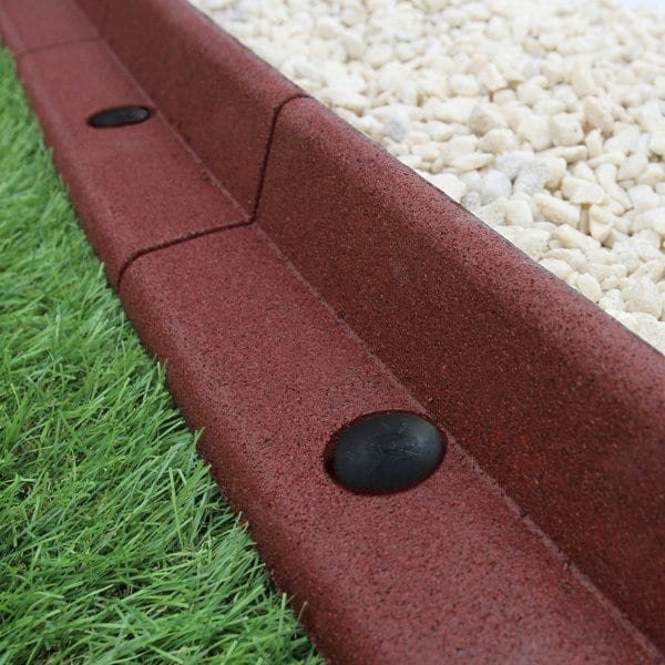 Flexible terracotta lawn edging, 1.2m long, featuring a textured surface and rounded shape, complements grass and gravel areas