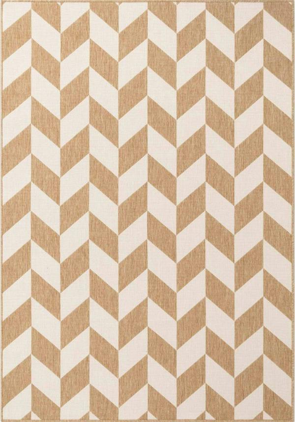 Rug with a beige and white chevron pattern