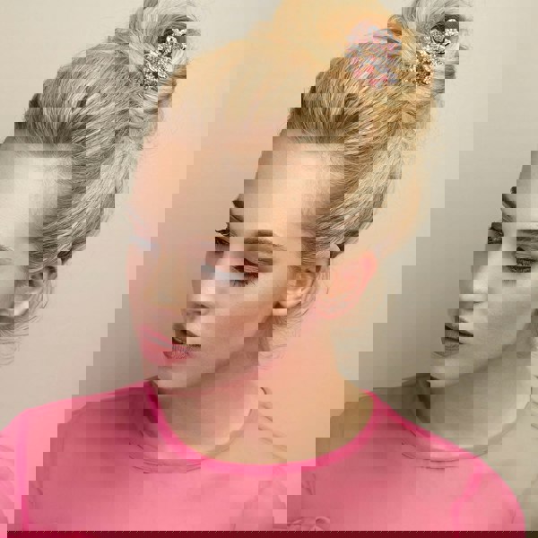 rose gold hair clip claw in pink with bun hairstyle