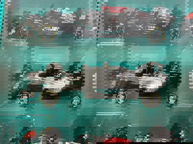 Mercedes AMG Petronas Formula 1 Set of 7 Cars with Display Stand 1:43 Scale Bburago 38170