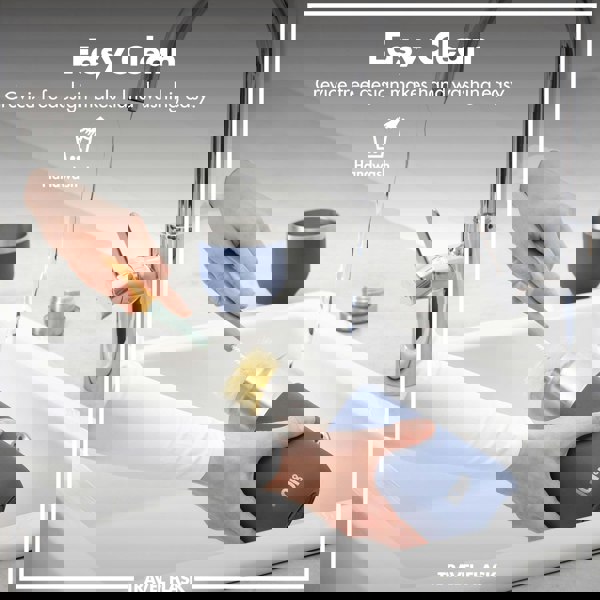 Person cleans travel flask with a brush under running water in a modern kitchen sink; text reads Easy Clean Crevice free design makes hand washing easy Handwash TRAVEL FLASK.