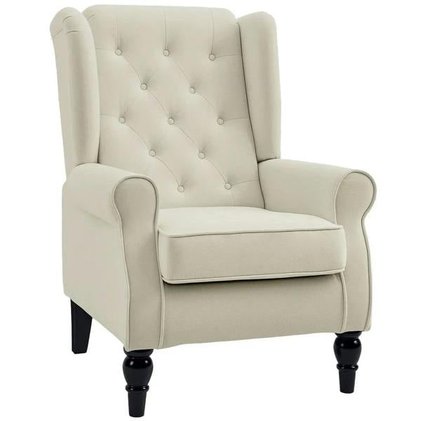 Cream wingback accent chair with button-tufted back, rolled arms, and turned legs
