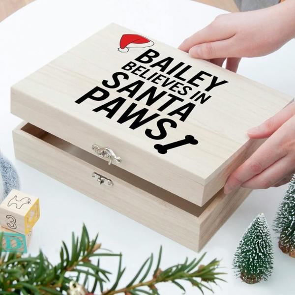 Personalised natural wooden Christmas Eve box for pets featuring Bailey Believes in Santa Paws print
