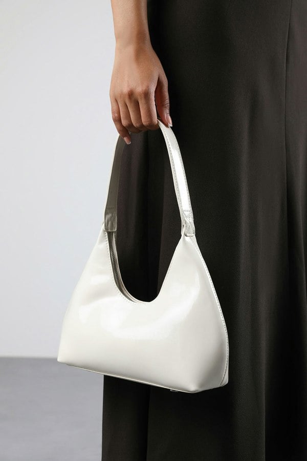 Where's That From Ecru Sleek Minimalist Hobo bag in Cream Patent Faux Leather
