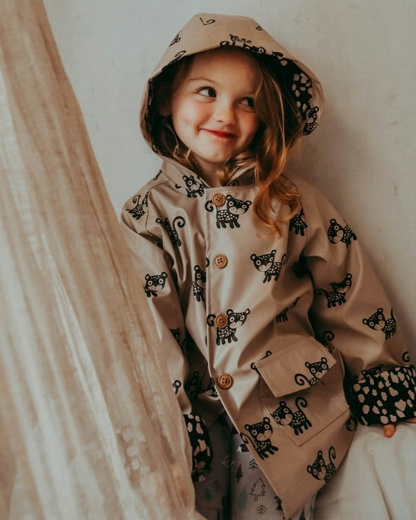 Girl wearing sustainable kids waterproof jacket