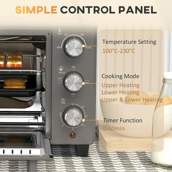 Grey oven control panel with three round dials for temperature, mode, and timer settings