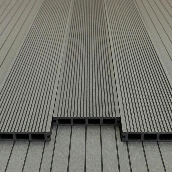 Jardí composite decking in Castle Grey, featuring a textured surface with parallel grooves and a durable, weather-resistant design