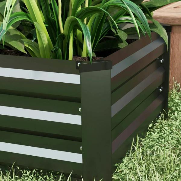 Dark grey steel planter box corner detail with slatted panels and top lip