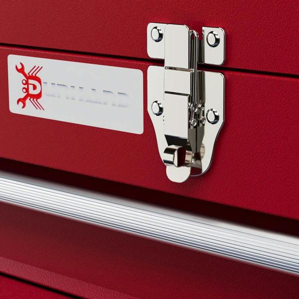 Chrome latch on red metal tool box front above chrome drawer rails