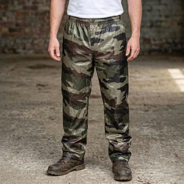 Arctic Strom Orbit waterproof camouflage trousers worn with outdoor boots