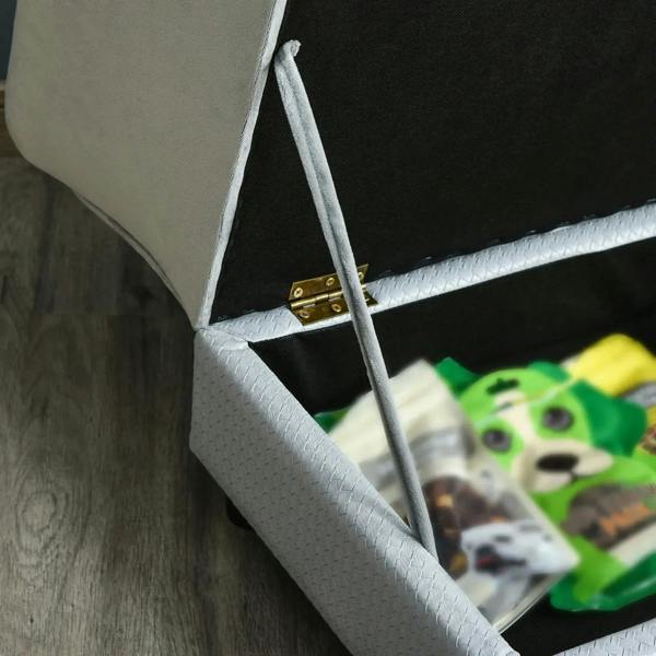 Open seat storage compartment inside light grey pet sofa chair with support bar