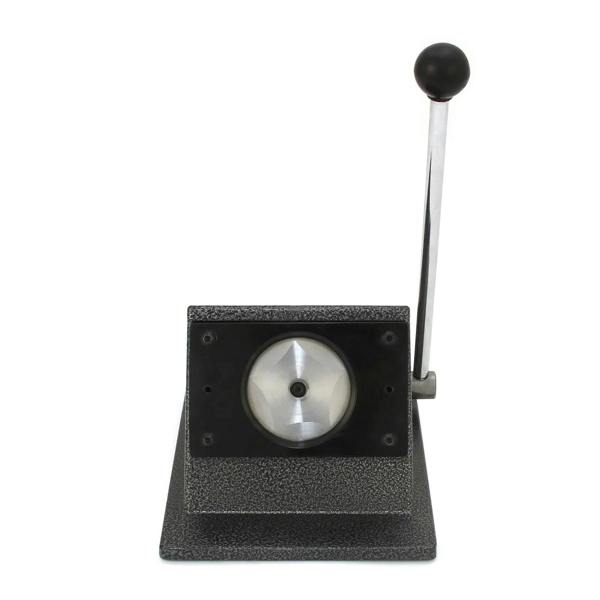 Heavy-duty badge maker with a sleek black base, silver lever, and circular cutting mechanism for creating custom badges
