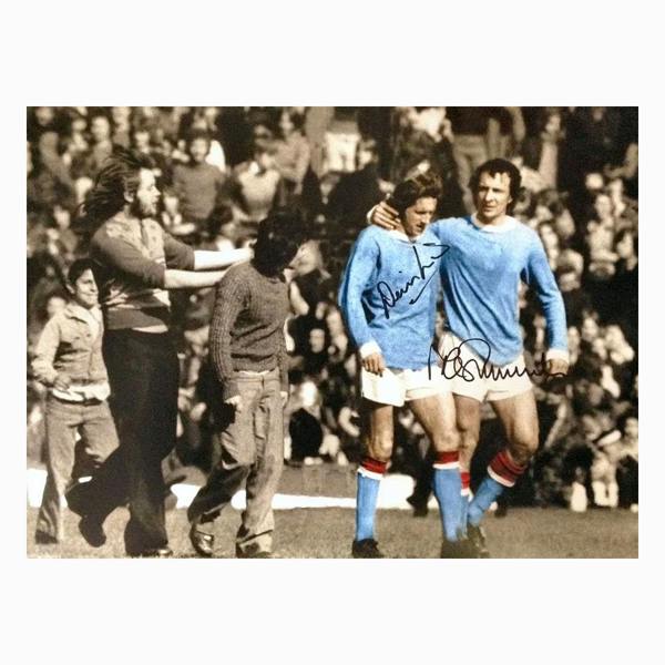 Denis Law & Mike Summerbee dual signed "The Backheel" photo. — Unframed