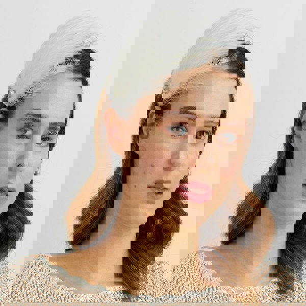 white fascinator feather headband wedding guest