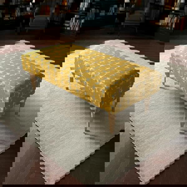 Versatile padded coffee table with premium hand stitched lid for modern interiors