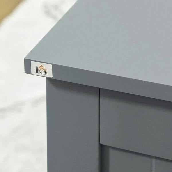 Grey storage chest corner detail with HOMCOM label on the side