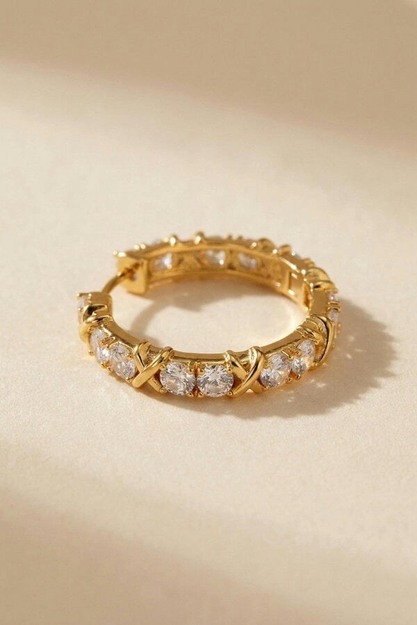 ARIIRA Lorelei Gold Tone Crystal Criss Cross Hoop Earrings