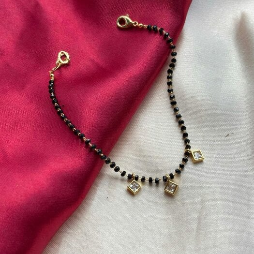 The Colourful Aura Black Beaded Mangalsutra Square Dangle Zircon Nazar bracelet