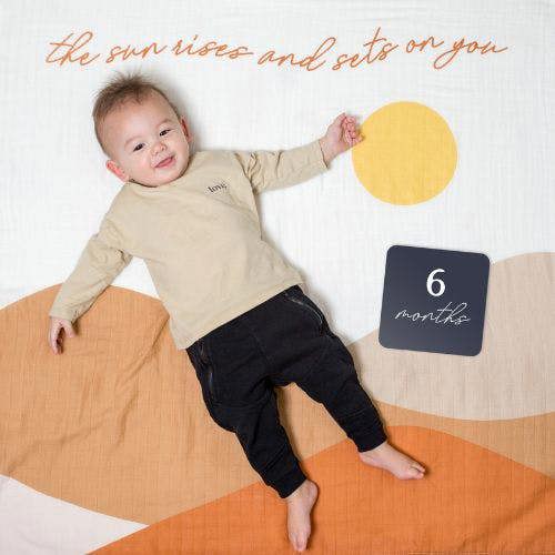 Lulujo - Baby's First Year Gift Set -  Cotton Swaddle & Cards - Sun Rises