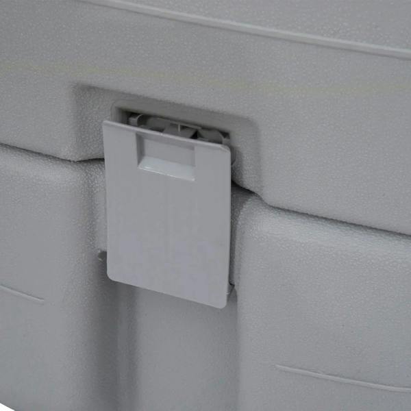Grey portable toilet close-up of side latch access panel near waste tank