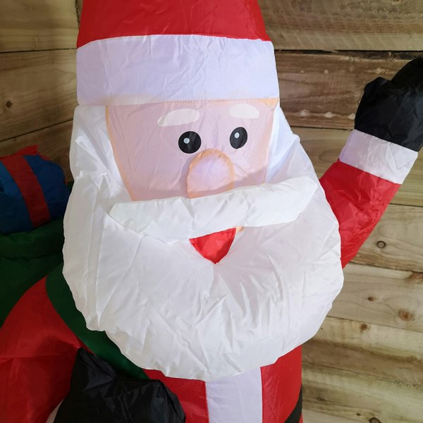 Samuel Alexander 130cm (4ft) Inflatable LED Outdoor Christmas Standing Santa with Gift in Sack