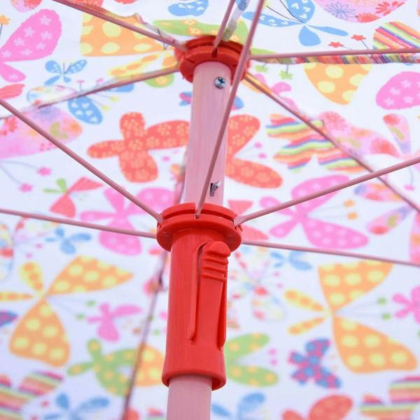 Butterfly umbrella close-up with red pole lock and cross-brace canopy frame