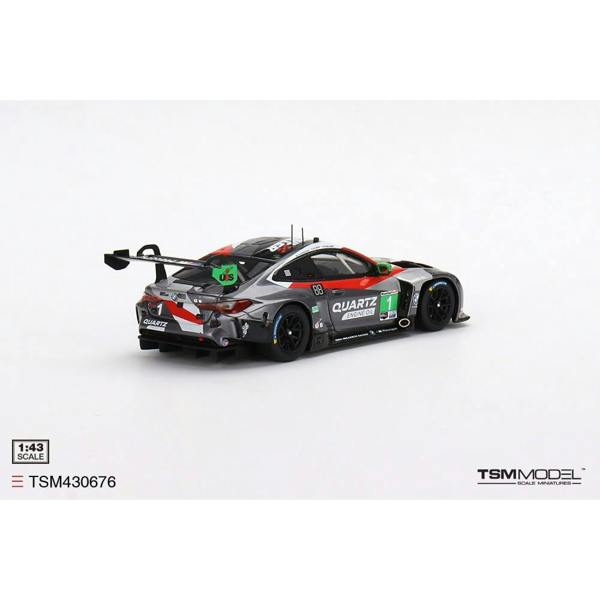 a toy race car on a white background