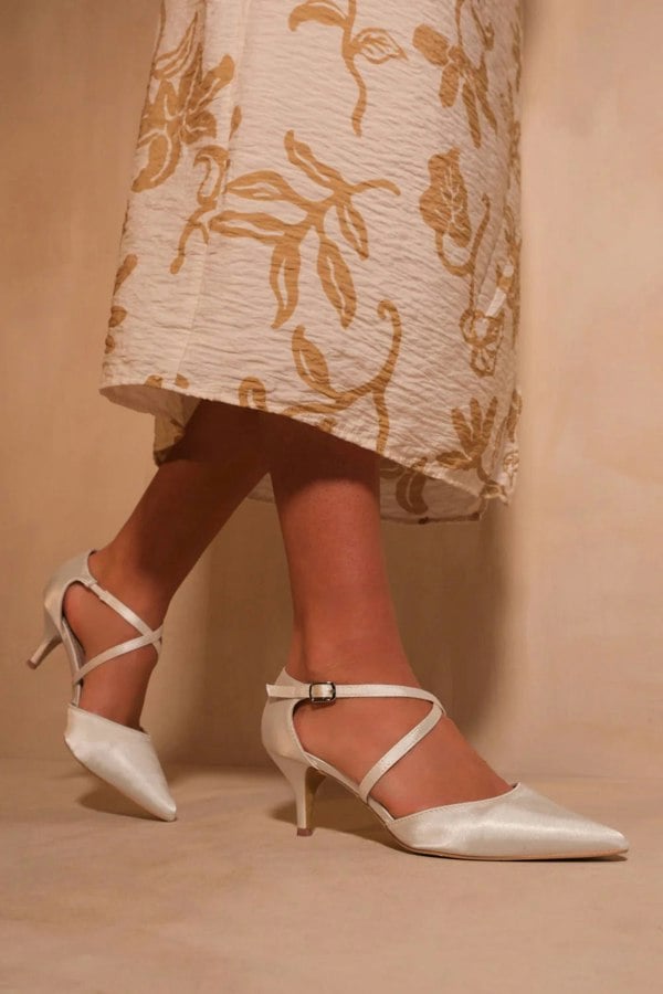 Where's That From Kennedi Wide Fit Low Kitten Heel With Crossover Strap in Off White Satin Silk