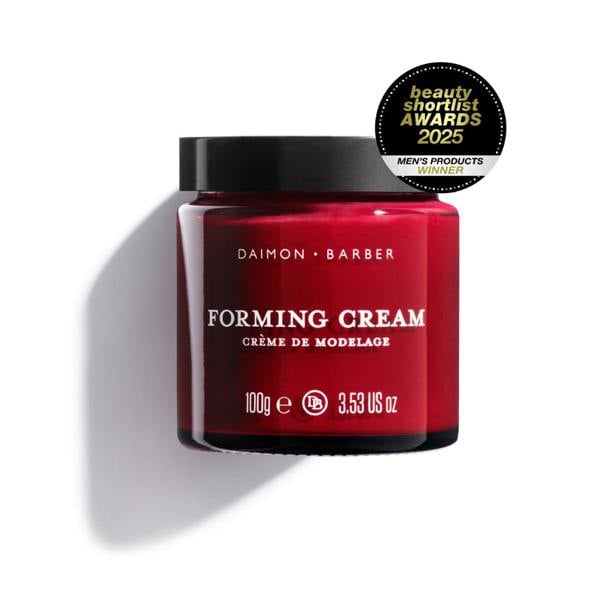 A red jar of DAIMON BARBER Forming Cream, with a black beauty shortlist awards 2025 winner badge, placed on a white background.