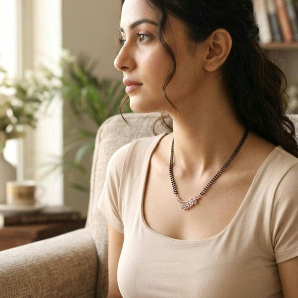 The Colourful Aura Rose Gold CZ Crystal Wing Leaf Mangalsutra Black Bead Necklace