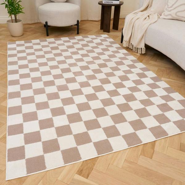 Checkered rug with brown and white squares on a wooden floor