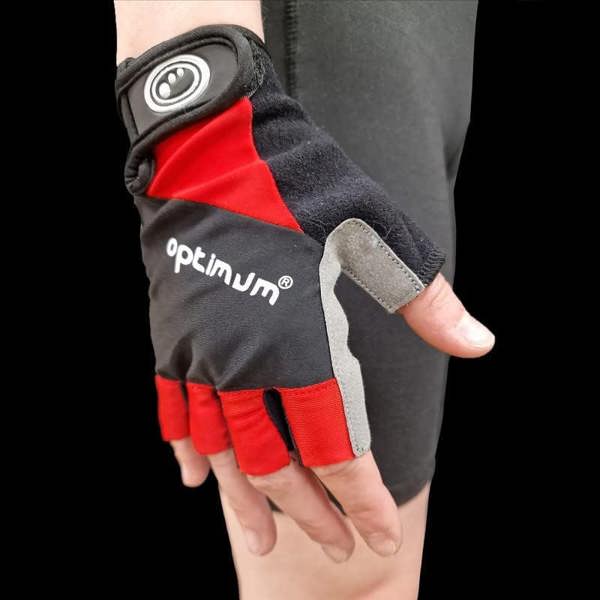 Black and red half-finger cycling glove worn on hand, back view with white Optimum logo, dark background - Optimum