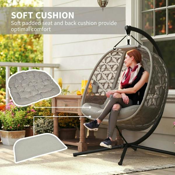 Outdoor hanging chair with soft padded seat and back cushions, patterned canopy, black stand