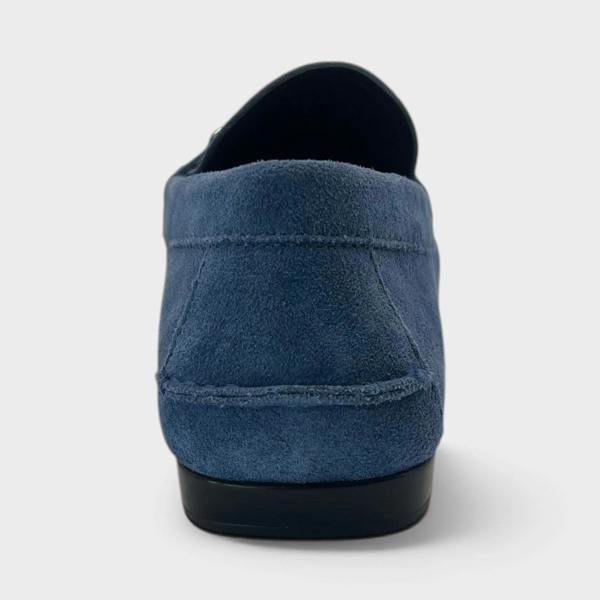Supplied Fashion Medusa Greca driver loafer in dark stone navy suede, back view showing the slip-on silhouette.