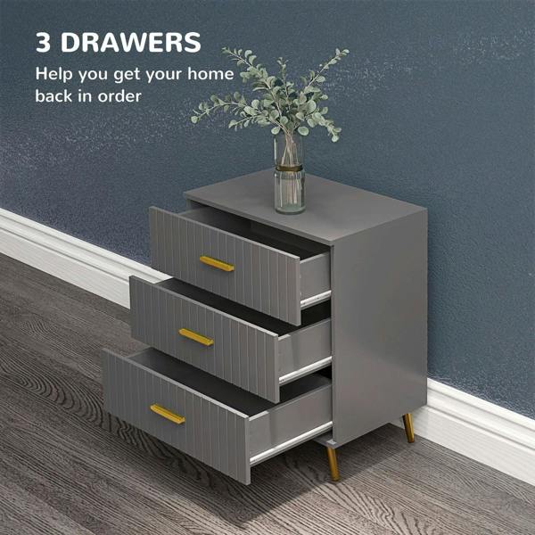 Dark grey three-drawer dresser with glossy finish, embossed vertical lines, and gold bar handles