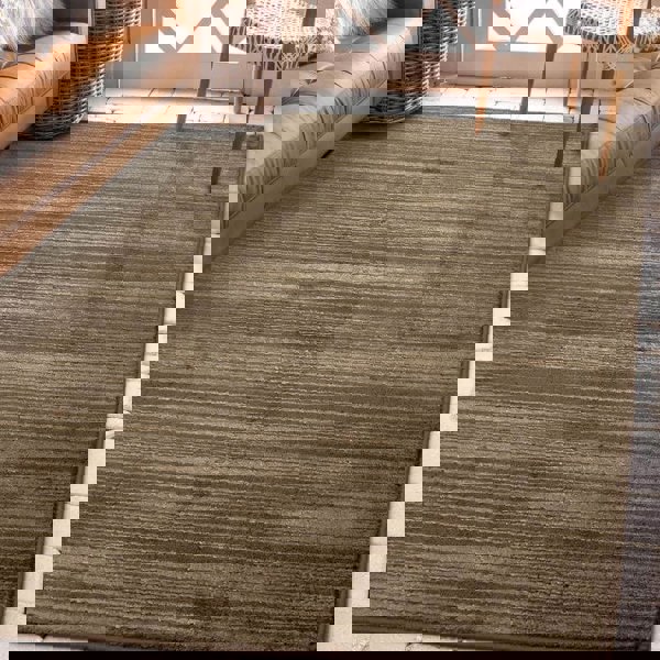Arlo Textured Rug with soft tone stripes in brown, adding sophistication to interiors.