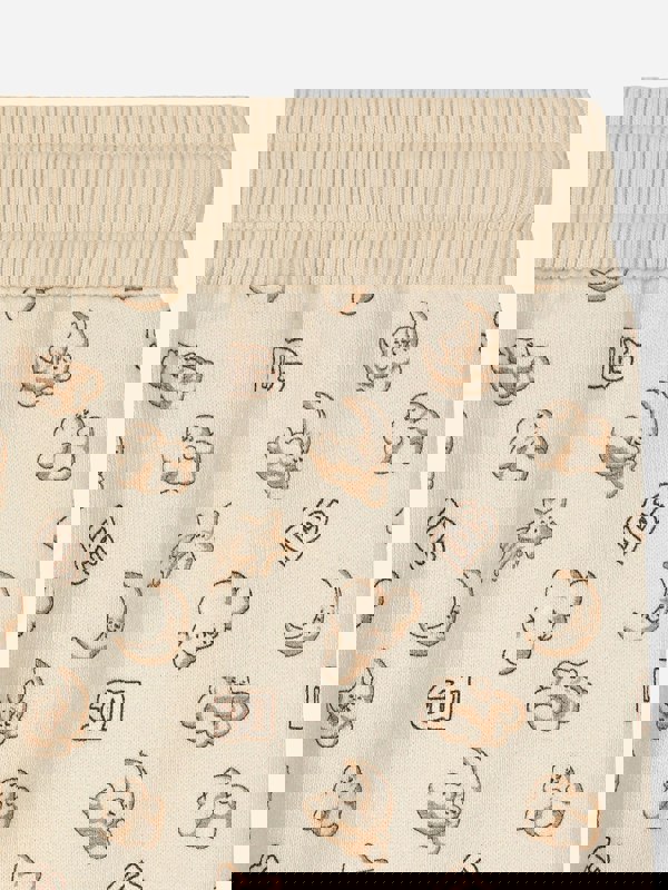 Dolce & Gabbana Kids Dolce & Gabbana Baby Moon and Star Joggers in Beige