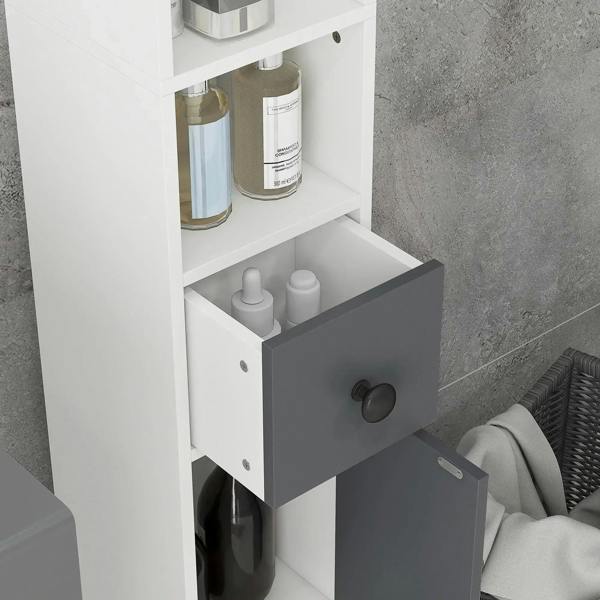 Grey bathroom cabinet interior with open shelves and grey drawer with round knob