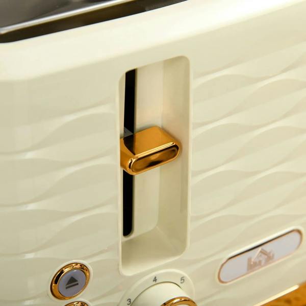 Beige toaster lever and browning control dials with copper accents, close-up
