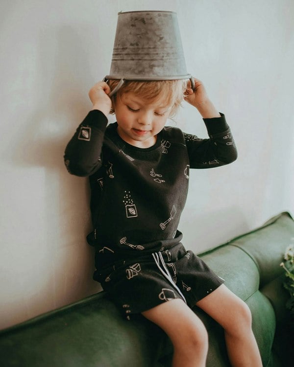 Boy wearing gender-neutral organic cotton kids shorts