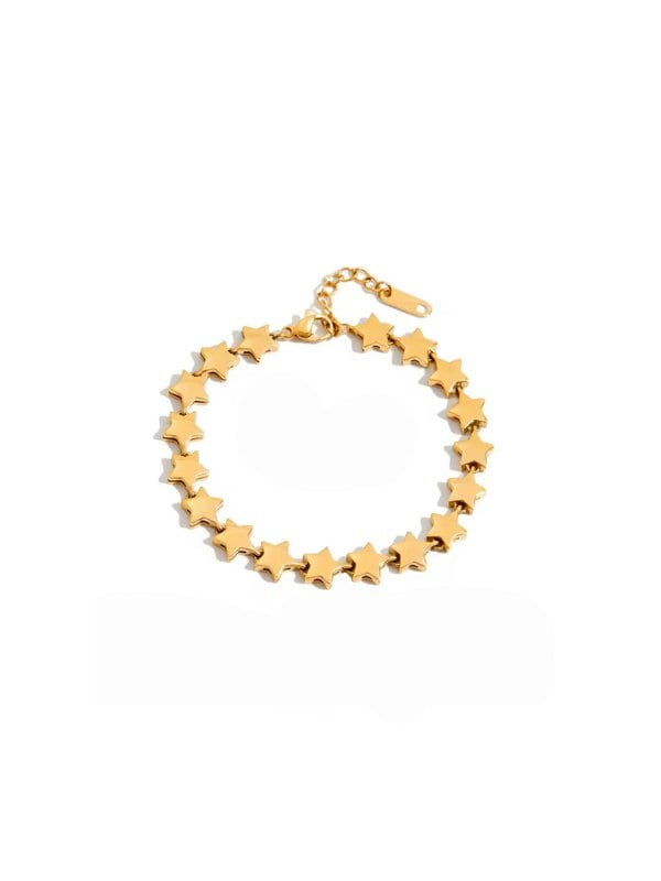 Gold star bracelet on a white background