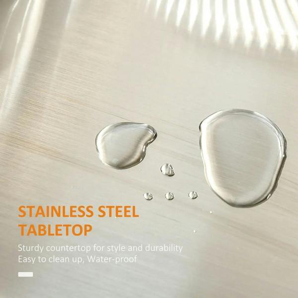 Stainless steel tabletop surface on a white kitchen island cart