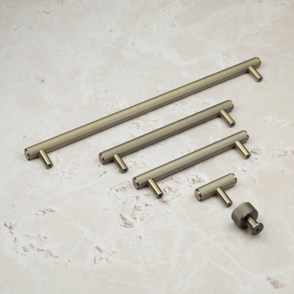 Handle & Home Antique Brass Reeded Handles and Coordinating Knobs