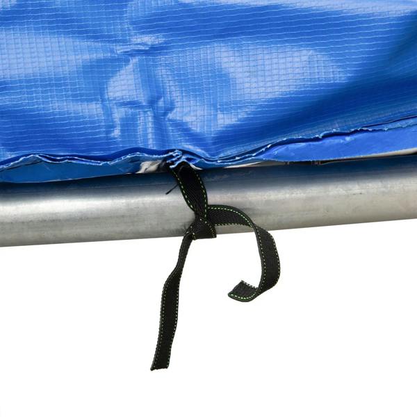 Close-up of black tie strap fastening on blue trampoline pad edge