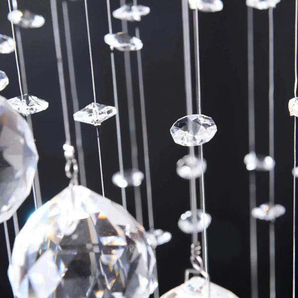 Close-up of crystal bead strands on chrome crystal chandelier pendant