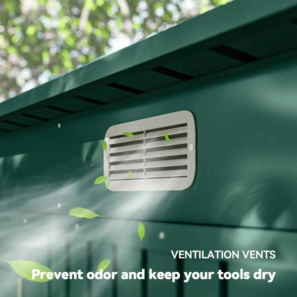 Green shed roof vent close-up with ventilation openings under the overhang
