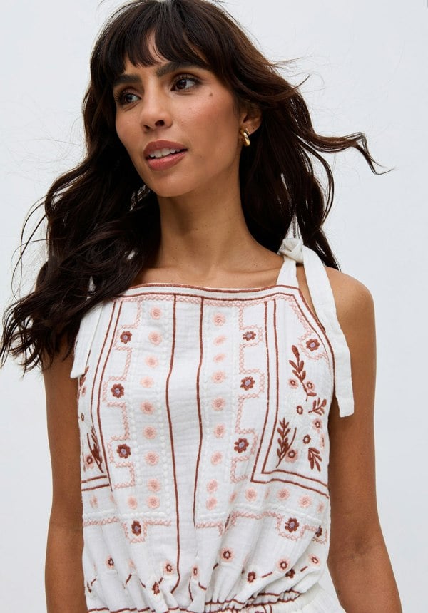 Sabina Sleeveless All Over Embroidered Playsuit In Cream